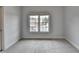 Neutral bedroom features carpet and natural light from large window at 2723 Ivy Bluff Ct, Buford, GA 30519