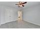 Spacious bedroom with double doors and ample closet space, providing comfort and storage at 2723 Ivy Bluff Ct, Buford, GA 30519