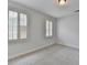 Bright bedroom with neutral carpet, and two windows with white shutters at 2723 Ivy Bluff Ct, Buford, GA 30519