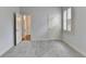 Light-filled bedroom with neutral carpet, closet, and window at 2723 Ivy Bluff Ct, Buford, GA 30519