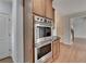 View of built in stainless oven in the kitchen at 2723 Ivy Bluff Ct, Buford, GA 30519