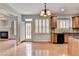 View of kitchen with breakfast area, stainless appliances and hardwood floors at 2723 Ivy Bluff Ct, Buford, GA 30519