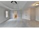Main bedroom features a tray ceiling, large closet and attached bathroom at 2723 Ivy Bluff Ct, Buford, GA 30519