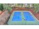 Aerial view of the community tennis courts, ready for a match any time of day at 2723 Ivy Bluff Ct, Buford, GA 30519