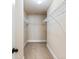 Empty walk-in closet with shelving for optimal storage at 461 Summerstone Ln, Lawrenceville, GA 30044