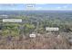 Aerial neighborhood view showcasing home's proximity to Crabapple Middle School at 10845 Shallowford Rd, Roswell, GA 30075