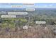 Aerial view of a home close to Roswell North Elementary, Crabapple Middle School and Downtown Roswell at 10845 Shallowford Rd, Roswell, GA 30075