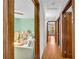 Hallway view into a bedroom and connecting rooms at 10845 Shallowford Rd, Roswell, GA 30075