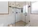 Frameless shower showcasing tile accents and a modern design for a luxurious experience at 1647 Grandeus Sw Ln, Stone Mountain, GA 30087