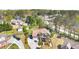Bird's eye view of a beautiful home and its surroundings featuring a long driveway and mature trees at 2245 Friars Gate Dr, Lawrenceville, GA 30043