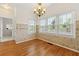Sunlit breakfast nook with tile accents, a chandelier, and large windows at 2245 Friars Gate Dr, Lawrenceville, GA 30043