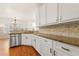 Kitchen view showcasing granite countertops and stainless steel dishwasher at 2245 Friars Gate Dr, Lawrenceville, GA 30043