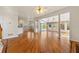 Open-concept living room featuring a fireplace and sunroom with abundant light at 2245 Friars Gate Dr, Lawrenceville, GA 30043