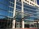 Modern building with glass facade and covered entrance, providing a sleek and professional appearance at 3324 Peachtree Ne Rd # 1010, Atlanta, GA 30326