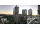 Scenic city view with high-rise buildings and a vibrant skyline at sunset at 3324 Peachtree Ne Rd # 1010, Atlanta, GA 30326