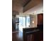 Modern kitchen featuring stainless steel appliances, dark wood cabinets, and an open layout for easy entertaining at 3324 Peachtree Ne Rd # 1010, Atlanta, GA 30326