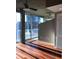 Bright living space with hardwood floors, large windows, and a balcony, offering stunning city views and natural light at 3324 Peachtree Ne Rd # 1010, Atlanta, GA 30326