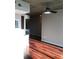 Bright living room with hardwood floors, ceiling fan and neutral paint, offering a cozy and inviting atmosphere at 3324 Peachtree Ne Rd # 1010, Atlanta, GA 30326