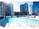 Rooftop pool area surrounded by modern skyscrapers, perfect for relaxation at 3324 Peachtree Ne Rd # 1010, Atlanta, GA 30326
