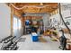 Unfinished basement with exposed ceiling, utility infrastructure, and workspace at 4020 Balleycastle Ln, Duluth, GA 30097