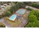 A community boasts a sparkling pool, tennis courts, and well-maintained landscaping for outdoor enjoyment at 4020 Balleycastle Ln, Duluth, GA 30097