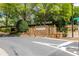 Stone community entrance sign with manicured landscaping, marking the neighborhood entrance with a welcoming touch at 4020 Balleycastle Ln, Duluth, GA 30097