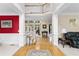 Grand foyer with hardwood floors, a soaring staircase, and elegant columns that accentuate the home's open layout at 4020 Balleycastle Ln, Duluth, GA 30097