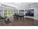 Game room with a ping pong table, recessed lighting and dark laminate flooring at 4020 Balleycastle Ln, Duluth, GA 30097