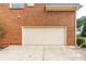 This property features a spacious two-car garage with an expansive driveway at 4020 Balleycastle Ln, Duluth, GA 30097