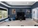 Home theater features recessed lighting, movie posters, bean bag chair and entertainment system at 4020 Balleycastle Ln, Duluth, GA 30097