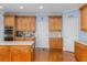 Well-equipped kitchen features stainless steel appliances and custom cabinetry for ample storage at 4020 Balleycastle Ln, Duluth, GA 30097
