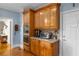 Updated kitchen features stainless steel appliances and custom wood cabinetry at 4020 Balleycastle Ln, Duluth, GA 30097