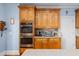 This kitchen is equipped with stainless steel appliances and custom cabinetry at 4020 Balleycastle Ln, Duluth, GA 30097