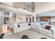 Expansive living room with staircase, open to the kitchen, and stylish decor at 4020 Balleycastle Ln, Duluth, GA 30097