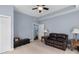 Sitting room with recessed lighting, a ceiling fan, and a comfortable leather sofa at 4020 Balleycastle Ln, Duluth, GA 30097