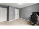 Bedroom with carpet, neutral paint, and closet at 5950 Bridge Stone Ct, Cumming, GA 30028