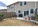 Backyard features patio with space for seating, and the yard is fenced in for privacy at 338 Oak Leaf Pl, Acworth, GA 30102