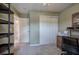 Bedroom with a ceiling fan, closet, and desk setup, bathed in natural light at 338 Oak Leaf Pl, Acworth, GA 30102