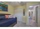 Bright bedroom with a closet, neutral carpet, and calming yellow walls throughout at 338 Oak Leaf Pl, Acworth, GA 30102
