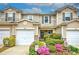 Lovely townhomes with well-manicured lawns, appealing exteriors, and convenient one car garages at 338 Oak Leaf Pl, Acworth, GA 30102