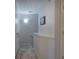 Carpeted stairwell features a decorative wall with an interesting textured pattern at 338 Oak Leaf Pl, Acworth, GA 30102