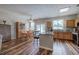 Open-concept kitchen and dining area featuring modern appliances and ample counter space at 338 Oak Leaf Pl, Acworth, GA 30102