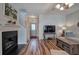 Comfortable living room with a fireplace, television, and ample space for Gathering gatherings at 338 Oak Leaf Pl, Acworth, GA 30102