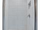 Modern shower with white tile, niche, and brushed silver shower fixtures at 4265 Easter Lily Ave, Buford, GA 30519
