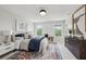 Bright bedroom with natural light, modern decor, and patterned ceiling at 6124 Kings Mountain Ct, Stone Mountain, GA 30087