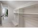 Walk in closet with many shelves at 6124 Kings Mountain Ct, Stone Mountain, GA 30087