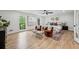 Spacious main bedroom with hardwood floors, sitting area, and ample natural light at 6124 Kings Mountain Ct, Stone Mountain, GA 30087