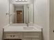 Bright bathroom vanity featuring a white countertop, mirror, and modern fixtures at 104 Natchez Trce, Atlanta, GA 30350