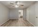 A bedroom featuring a ceiling fan with an attached bathroom at 104 Natchez Trce, Atlanta, GA 30350