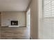 Bright living room with fireplace and view to screened porch with lots of natural light at 104 Natchez Trce, Atlanta, GA 30350